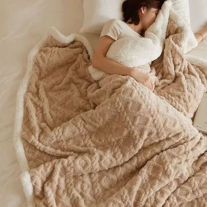 Blødt lammeuldstæppe i mikrofiberflonel til varme vinteraftener