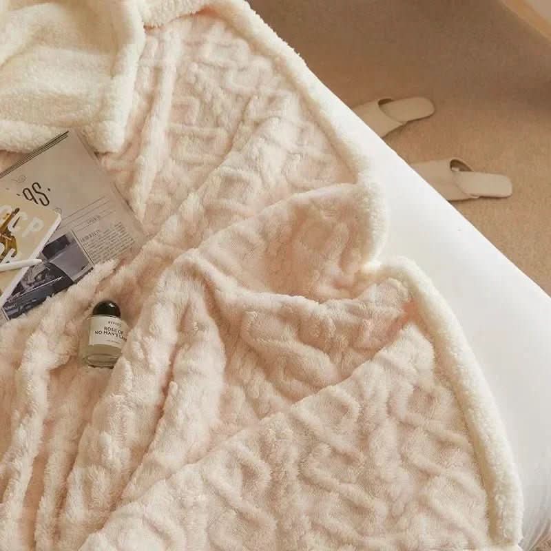 Blødt lammeuldstæppe i mikrofiberflonel til varme vinteraftener